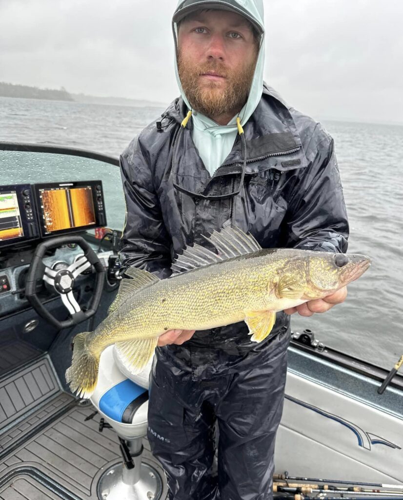 Guide Corbin Hime with a big Leech Lake Walleye.