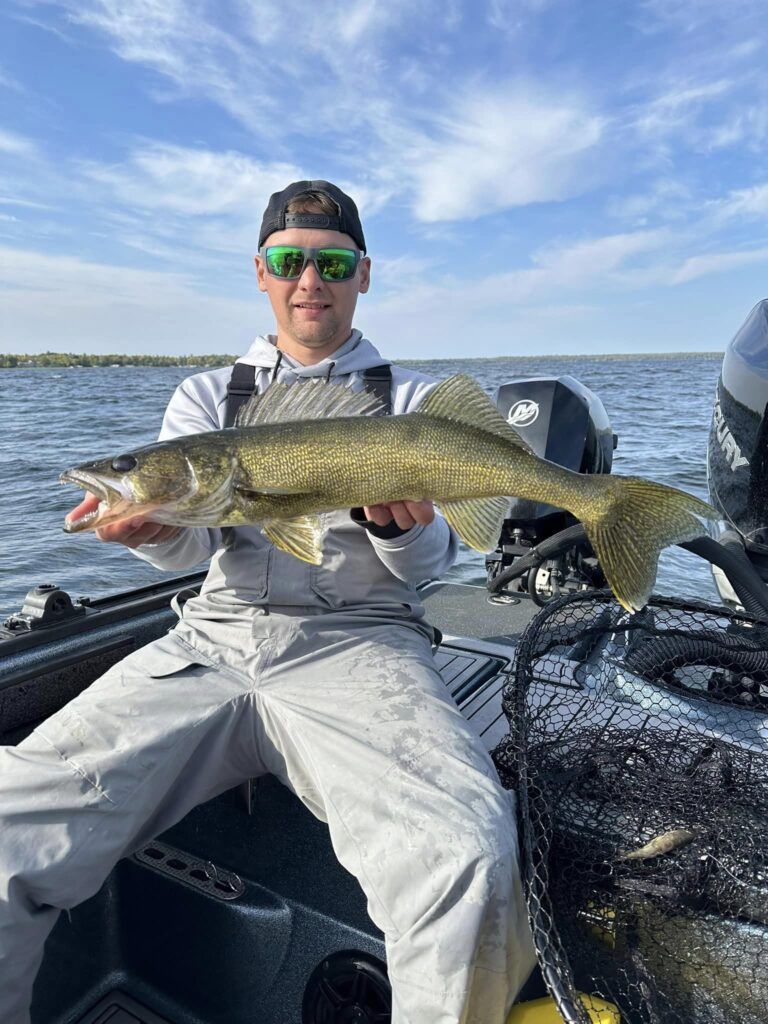 Part Time Cass Lake Area Guide Service Guide, Zach Posner with a big Lake Bemidji Walleye.